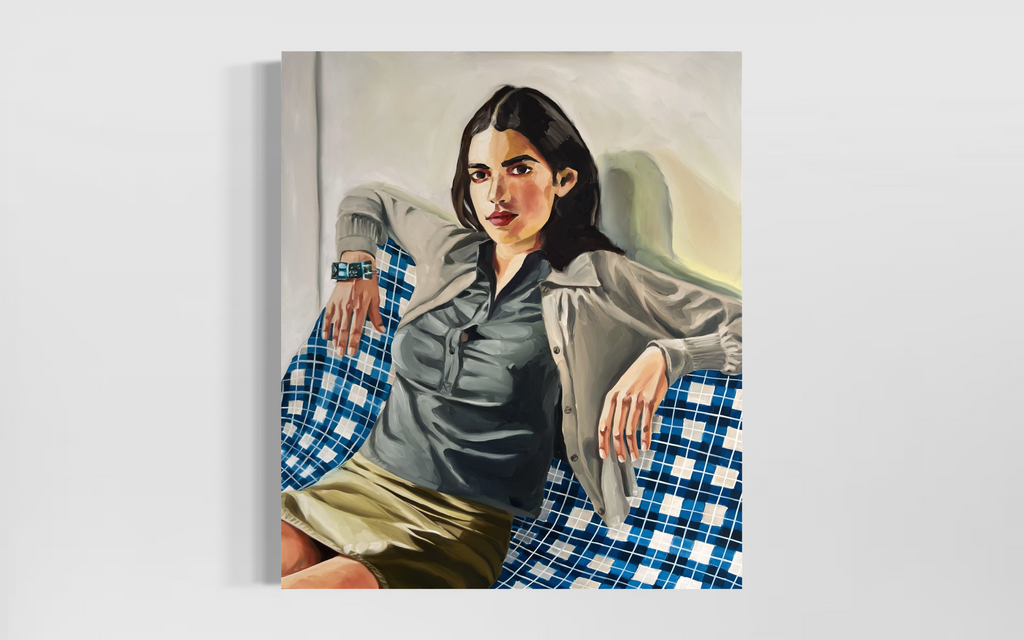 French girl on checkered sofa